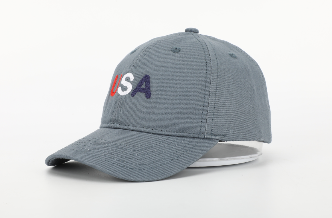 USA Hat for children featuring a cognac leather adjustable strap and needlepoint embroidery designs.