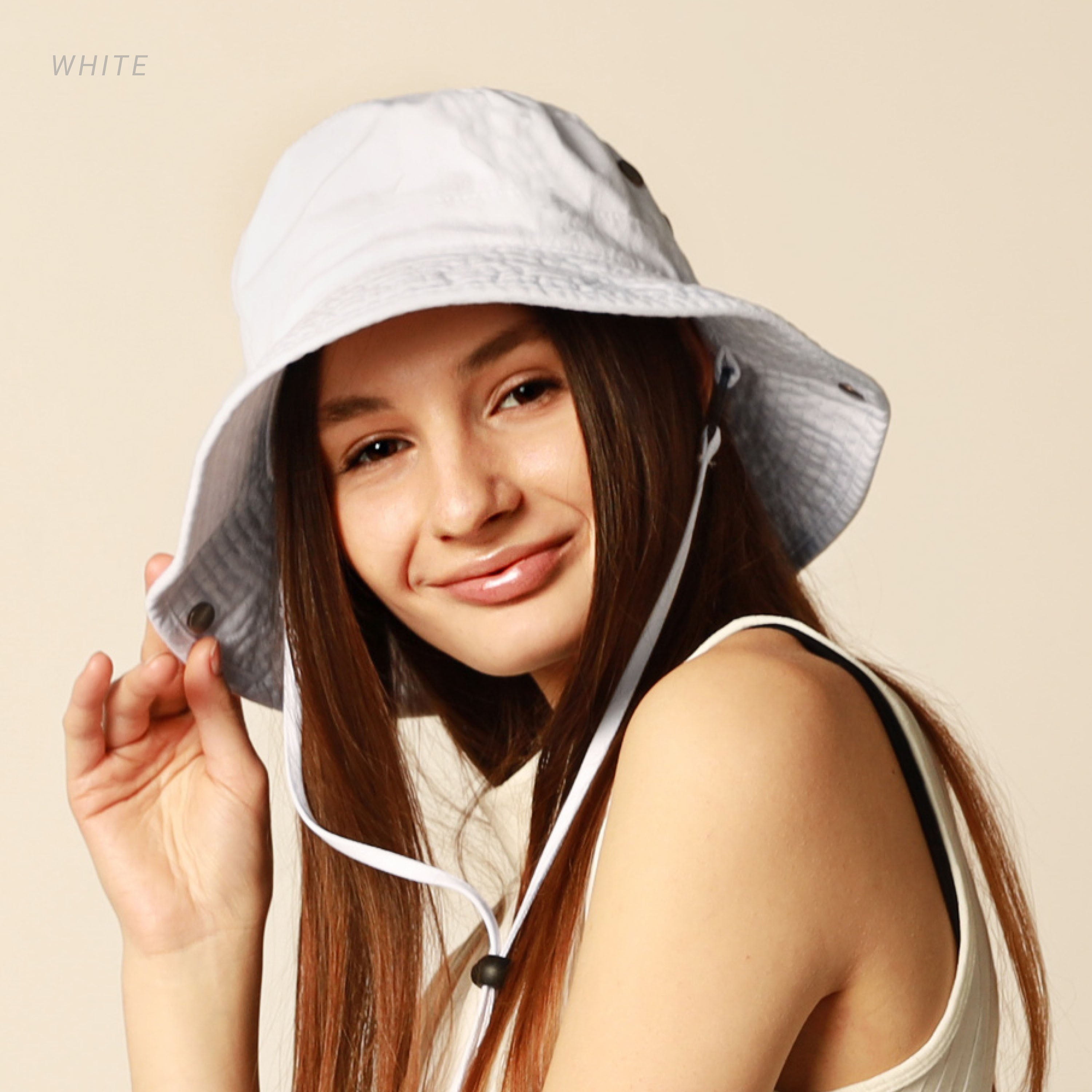 Wide Brim Bucket Hat made of soft cotton, featuring a flexible brim for comfort and UV protection, perfect for outdoor activities.