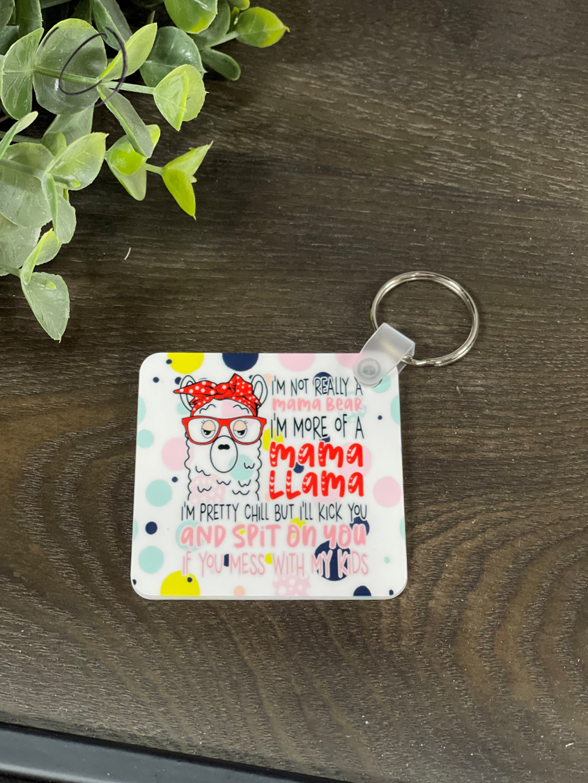 Mama Llama Keychain featuring a vibrant double-sided design, made from durable plastic, measuring 2.25 inches by 2.25 inches.