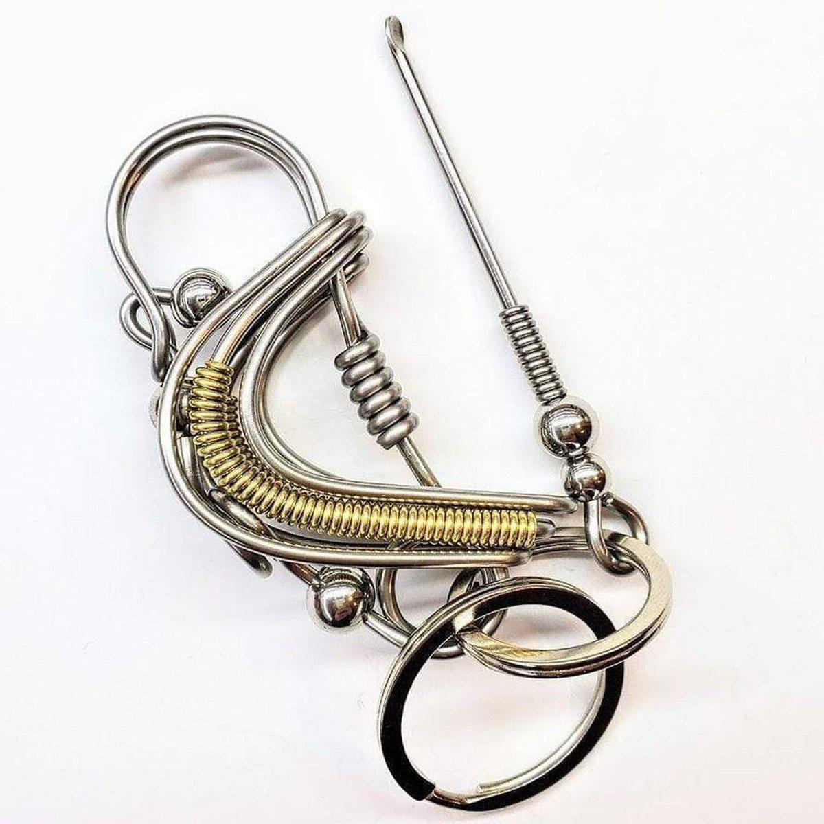 Wire Coiled Birdie Keychain for Him, featuring a sturdy steel wire design with brass-accented wings, measuring 2.5 inches in length.