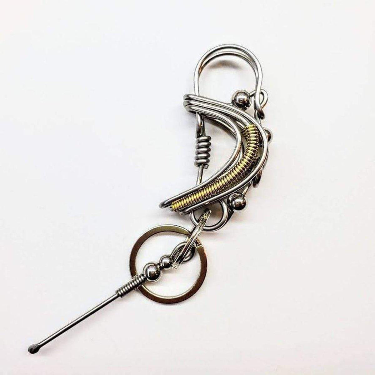 Wire Coiled Birdie Keychain for Him, featuring a sturdy steel wire design with brass-accented wings, measuring 2.5 inches in length.