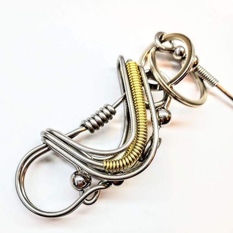 Wire Coiled Birdie Keychain for Him, featuring a sturdy steel wire design with brass-accented wings, measuring 2.5 inches in length.