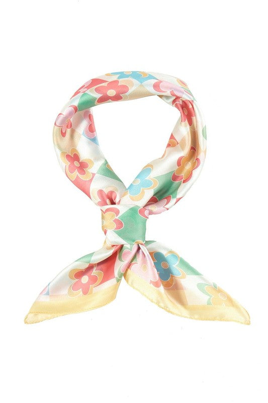 A vibrant abstract leaf printed silky square scarf, showcasing intricate leaf patterns in rich colors, perfect for stylish accessorizing.