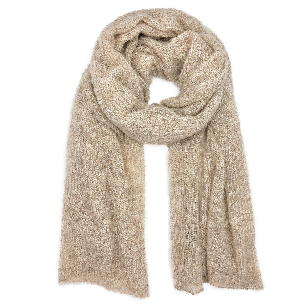 Almond Ultra Plush Alpaca Scarf displayed elegantly, showcasing its soft texture and oversized design, perfect for warmth and style.