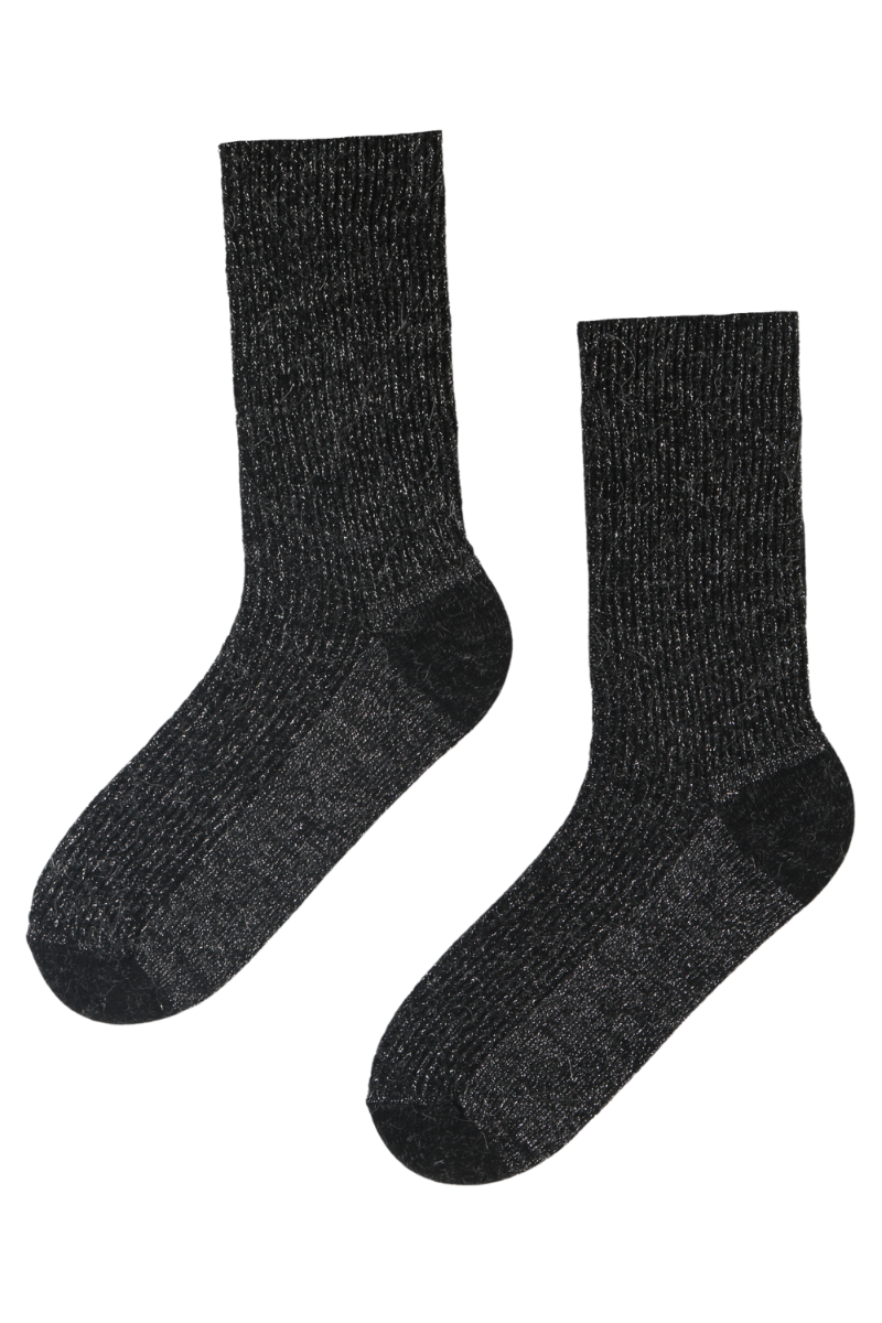 A pair of luxurious black sparkly socks made from alpaca wool, showcasing their soft texture and elegant design.