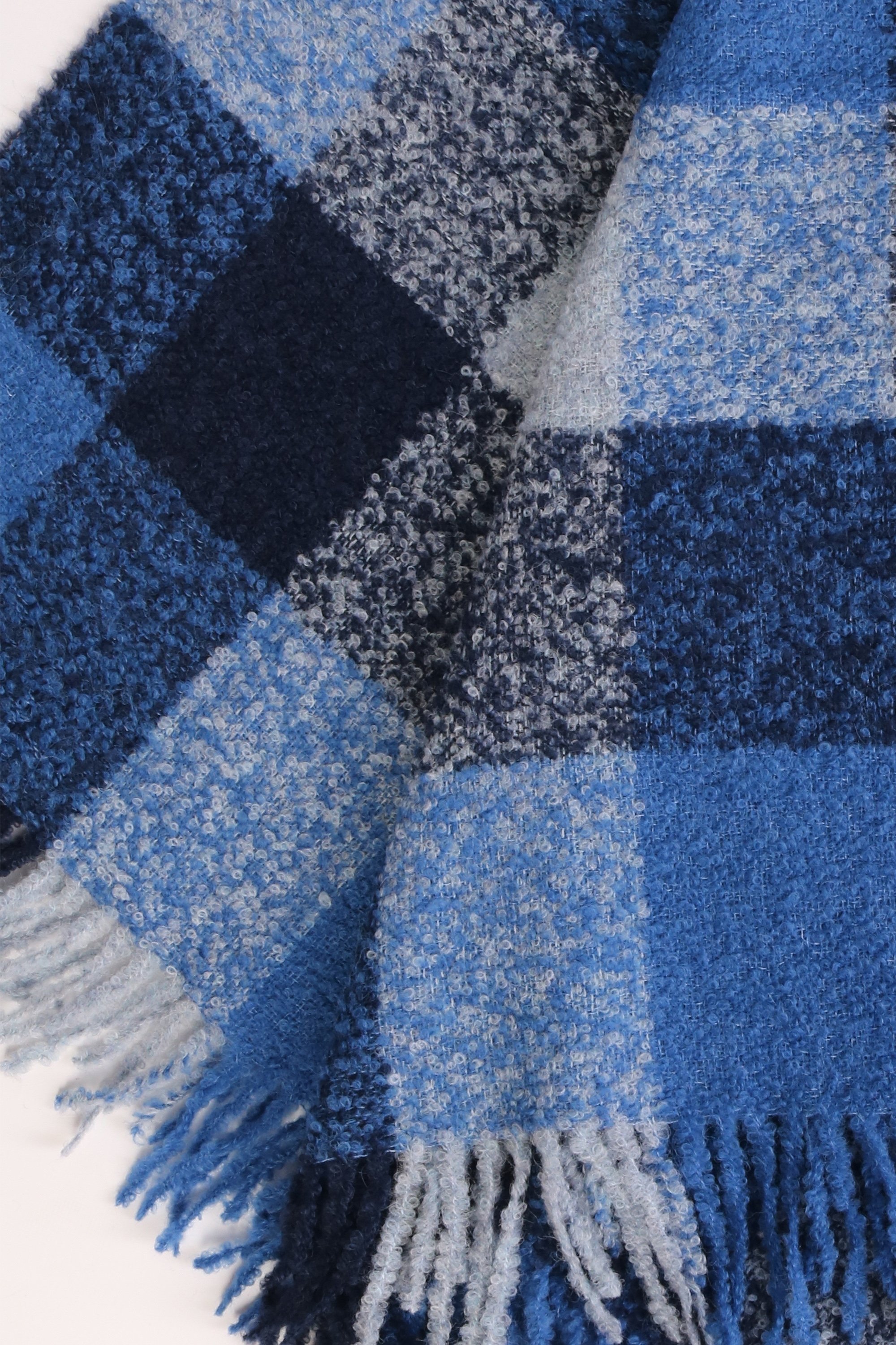 Luxurious blue grey checkered plaid made from 100% alpaca wool, perfect for autumn and winter.