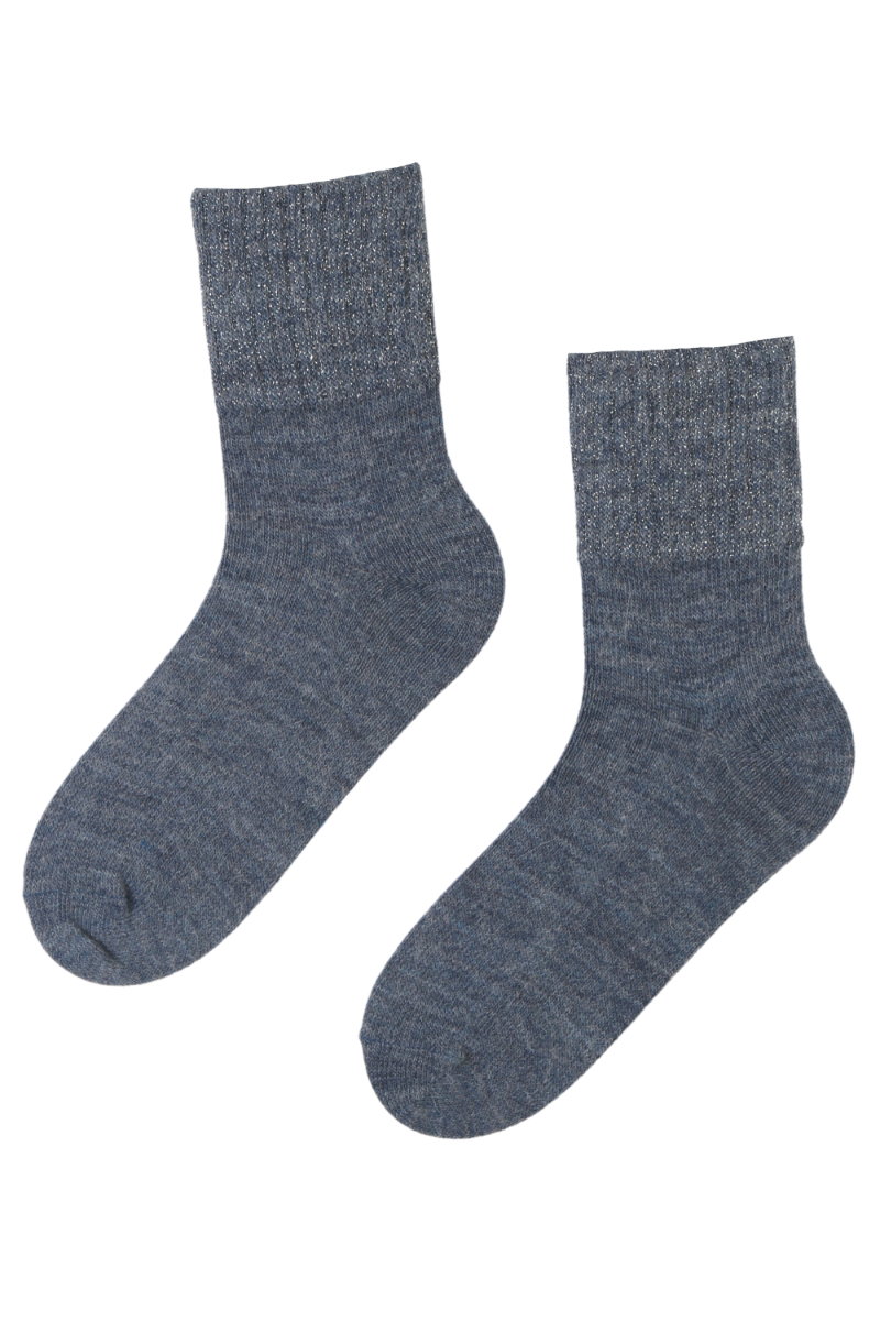 A pair of luxurious blue socks made from alpaca wool, featuring a sparkling ribbed edge, perfect for women's fashion.