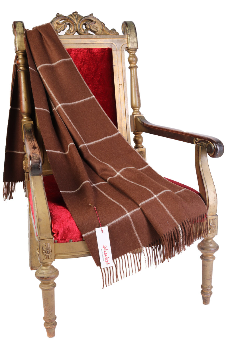 Luxurious brown checkered plaid made from 100% alpaca wool, showcasing its soft texture and elegant design.