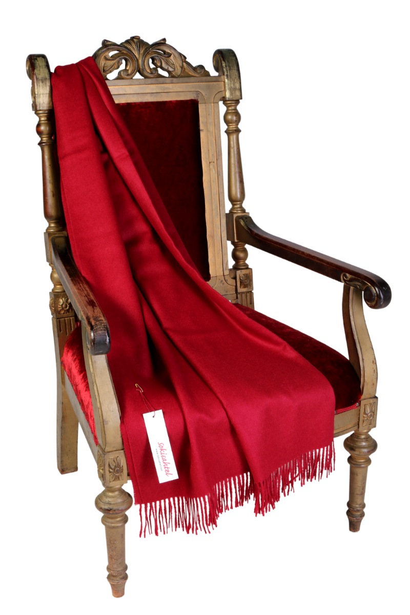 Luxurious dark red plaid blanket made from 100% alpaca wool, showcasing its soft texture and elegant design.