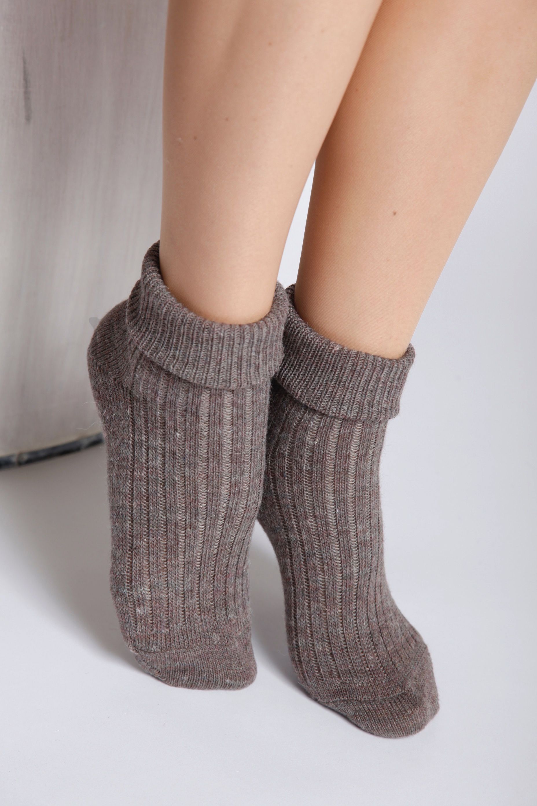 ALPAKA mocca socks in gray-brown color, showcasing their soft texture and elegant design.