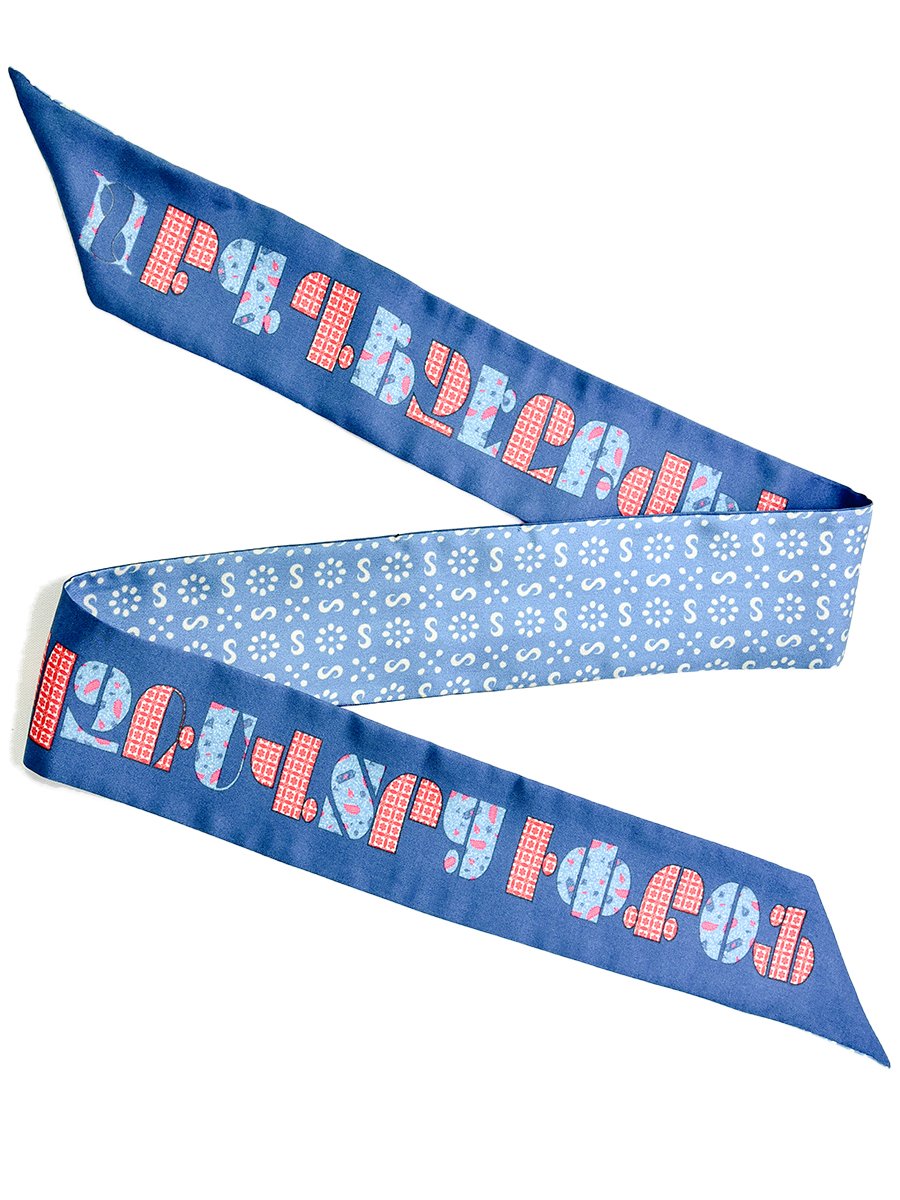 Armenian Alphabet Blue narrow scarf made of silk twill, featuring historic Bible cover design and ornamental patterns, elegantly displayed in a gift box.