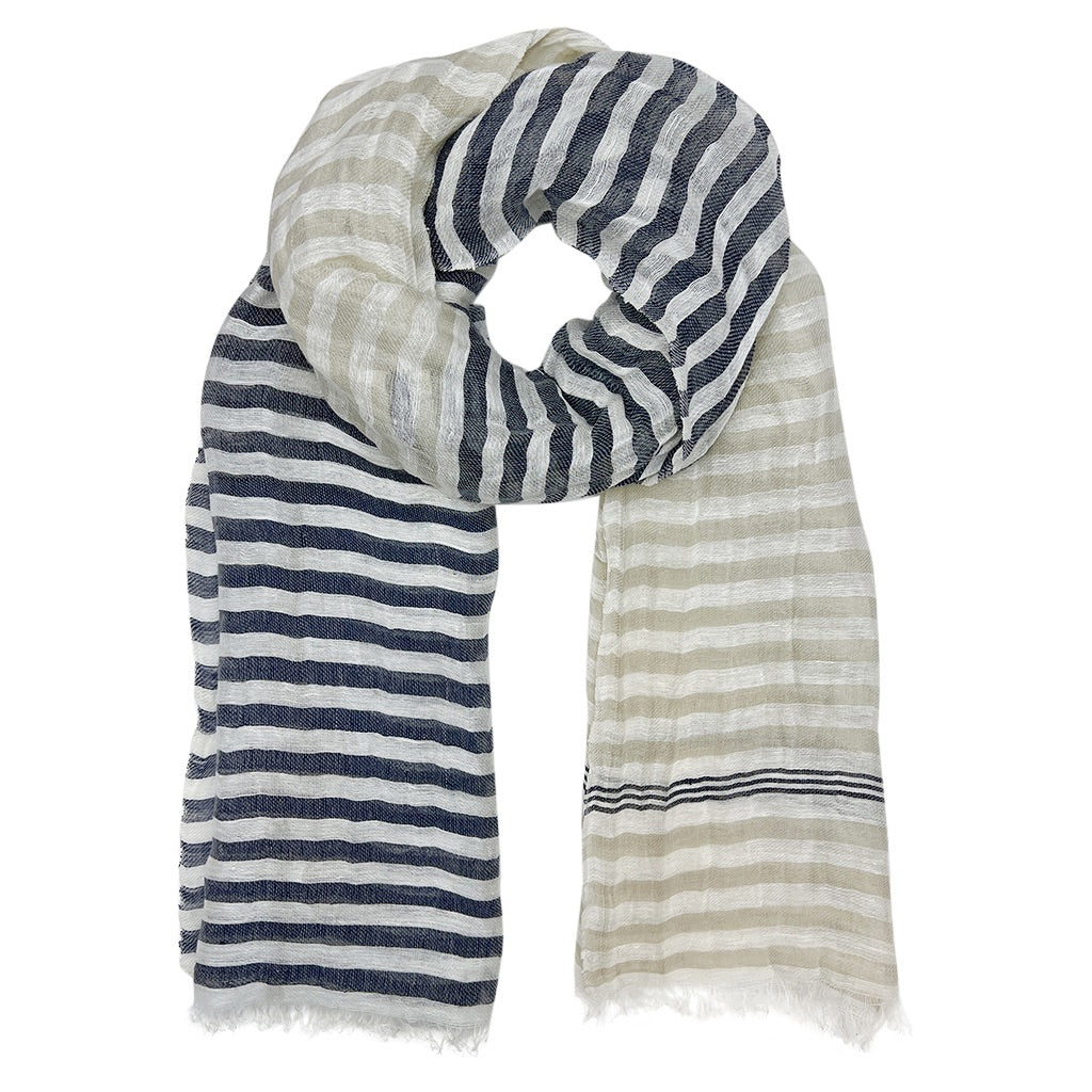 A beautifully hand-loomed Cabana Linen Blend Wrap Scarf showcasing navy, sand, and white colors, draped elegantly.