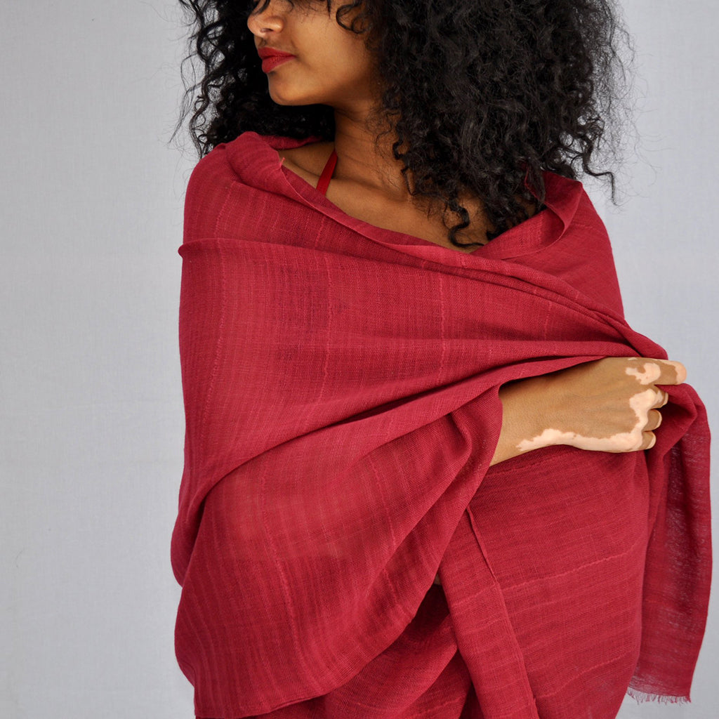 A vibrant oversized Classic Cotton Wrap Scarf hand-loomed from pure Ethiopian cotton, featuring an eyelash fringe edge.