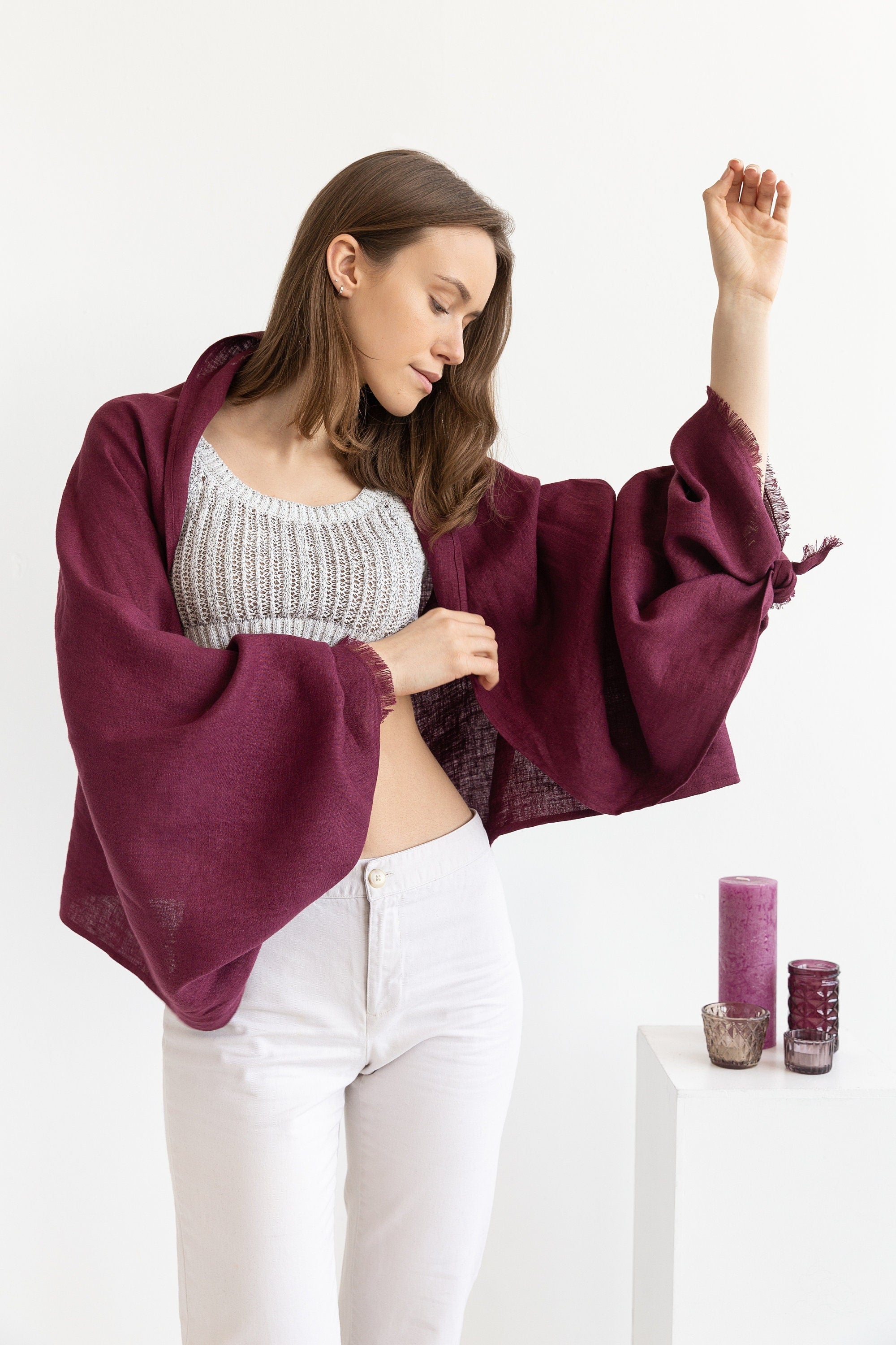 A stylish Dark Plum linen scarf made from 100% stonewashed linen, showcasing its soft texture and vibrant color.