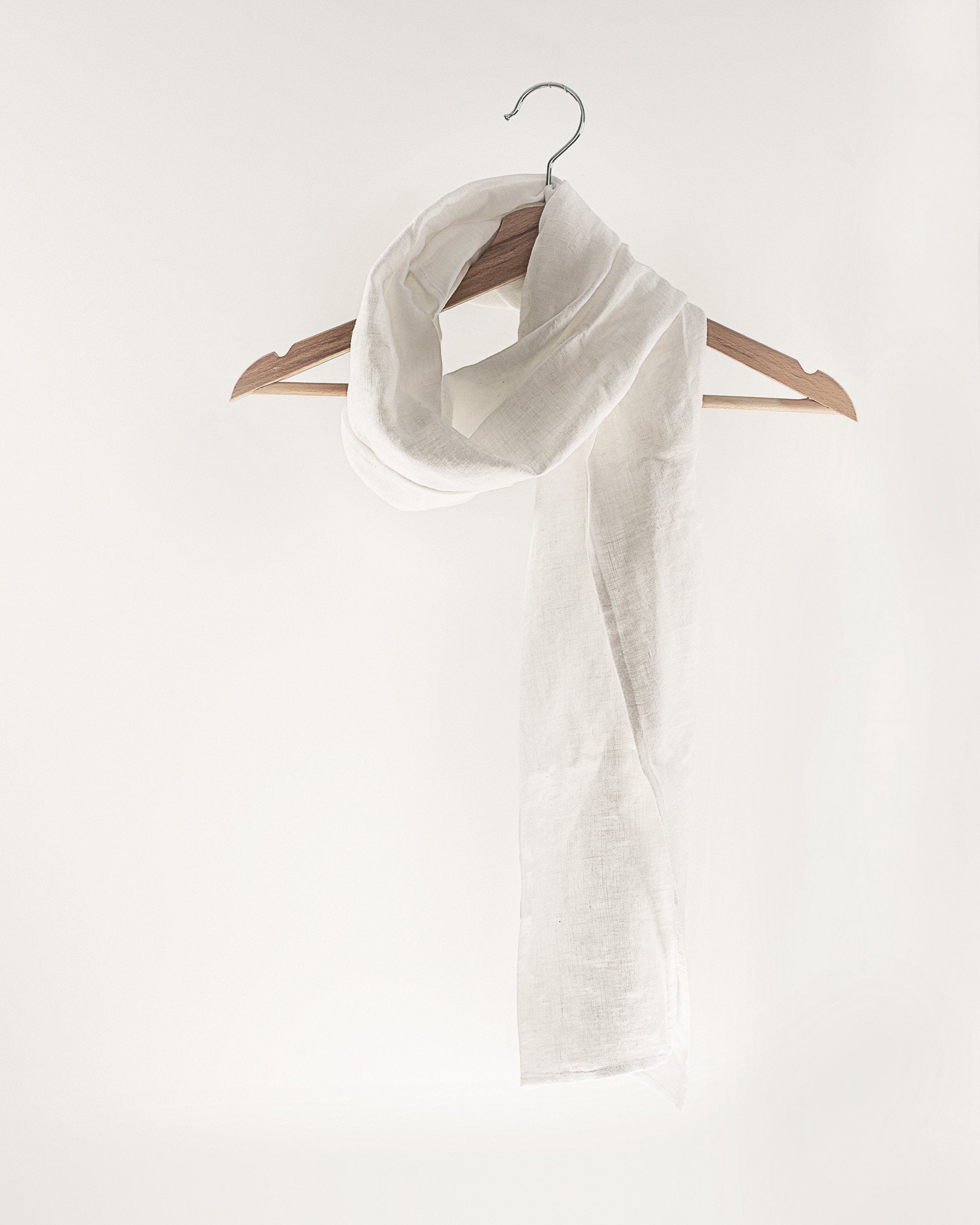 A stylish Dark Plum linen scarf made from 100% stonewashed linen, showcasing its lightweight and soft texture.