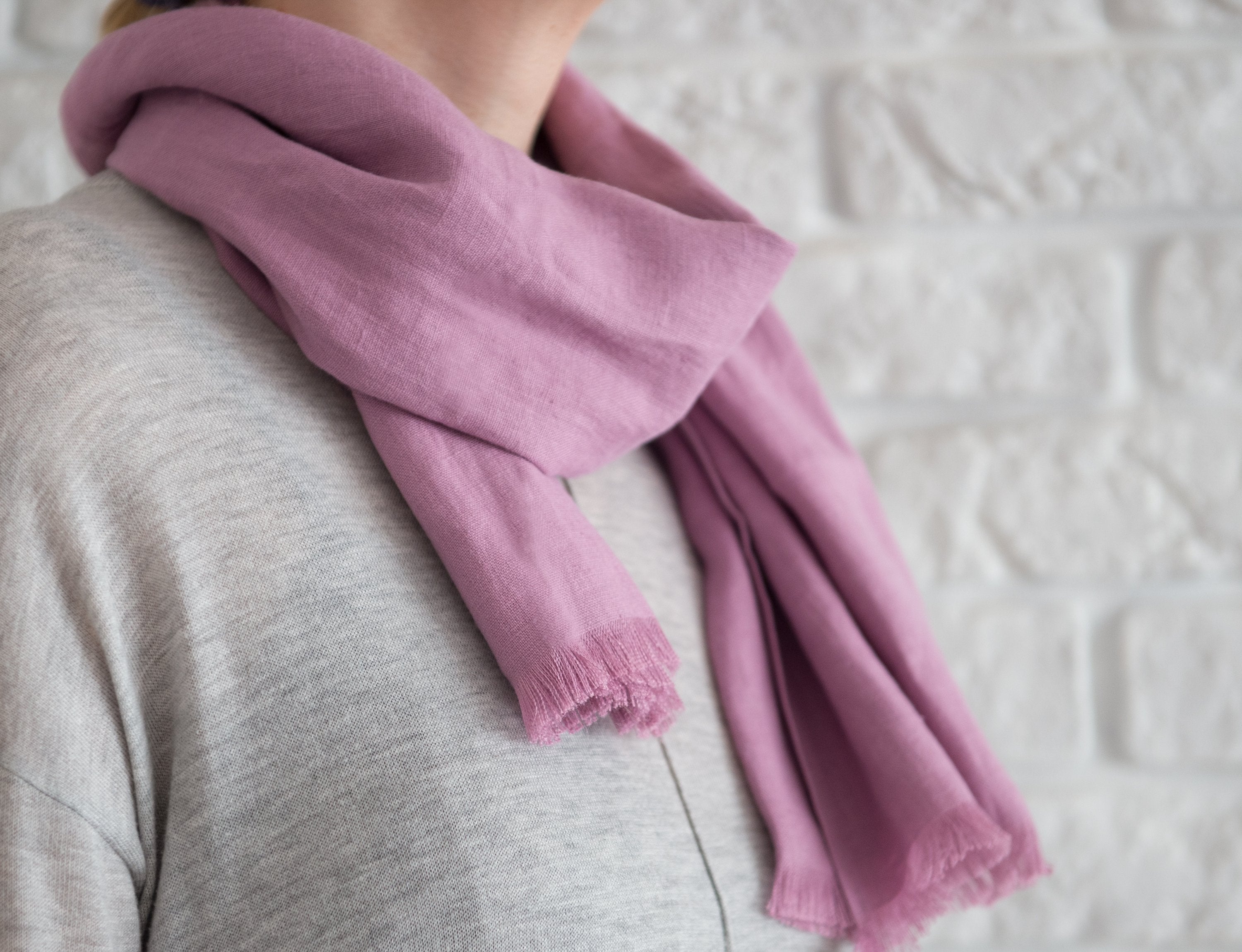 Deep Rose linen scarf made from 100% stonewashed linen, showcasing its elegant drape and soft texture.