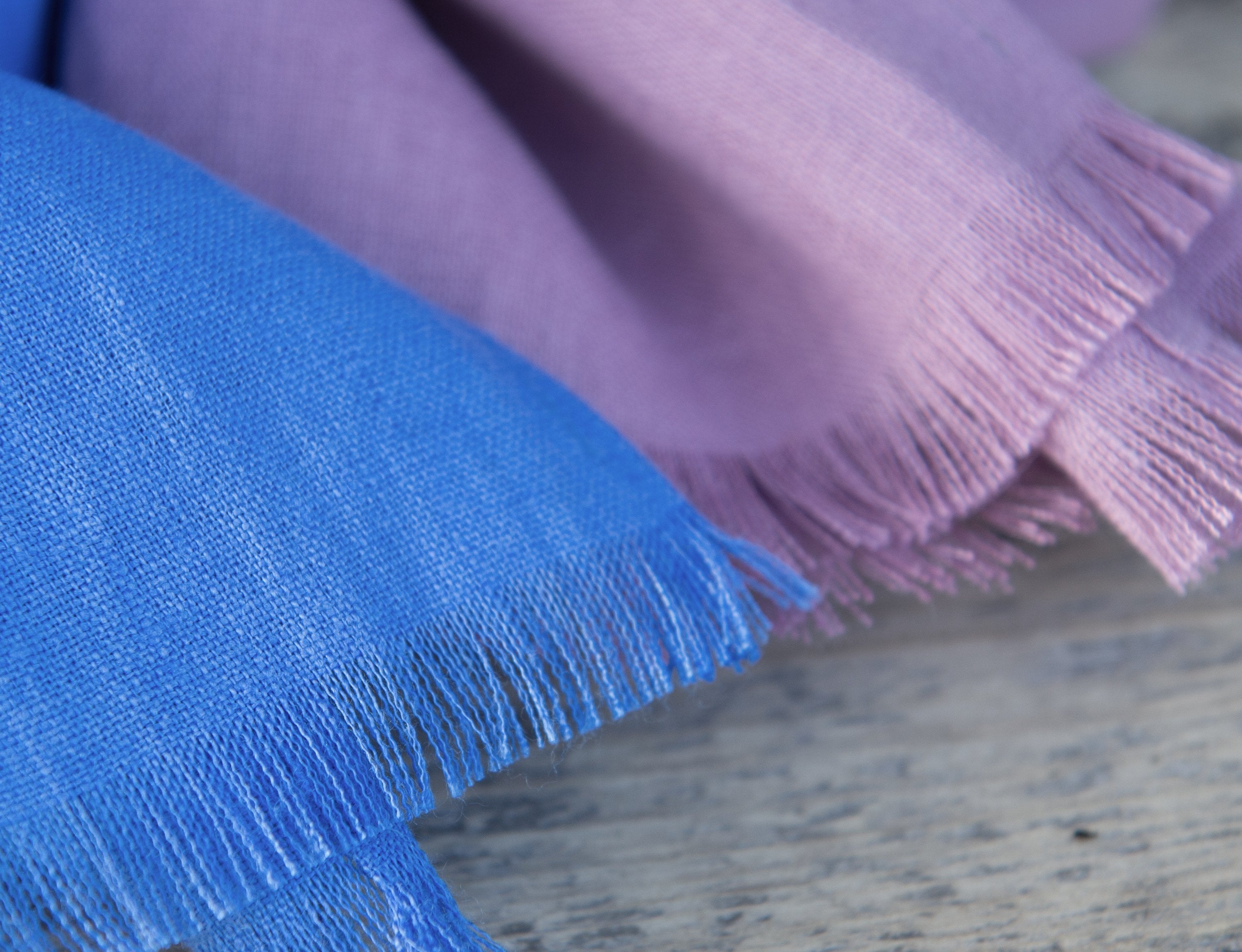 Deep Rose linen scarf made from 100% stonewashed linen, showcasing its elegant drape and soft texture.