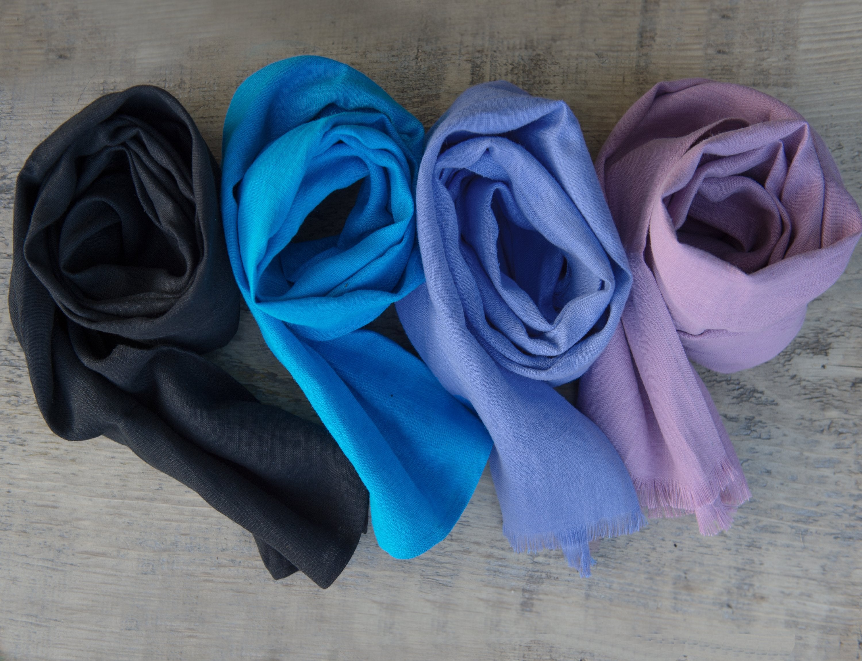 Deep Rose linen scarf made from 100% stonewashed linen, showcasing its elegant drape and soft texture.