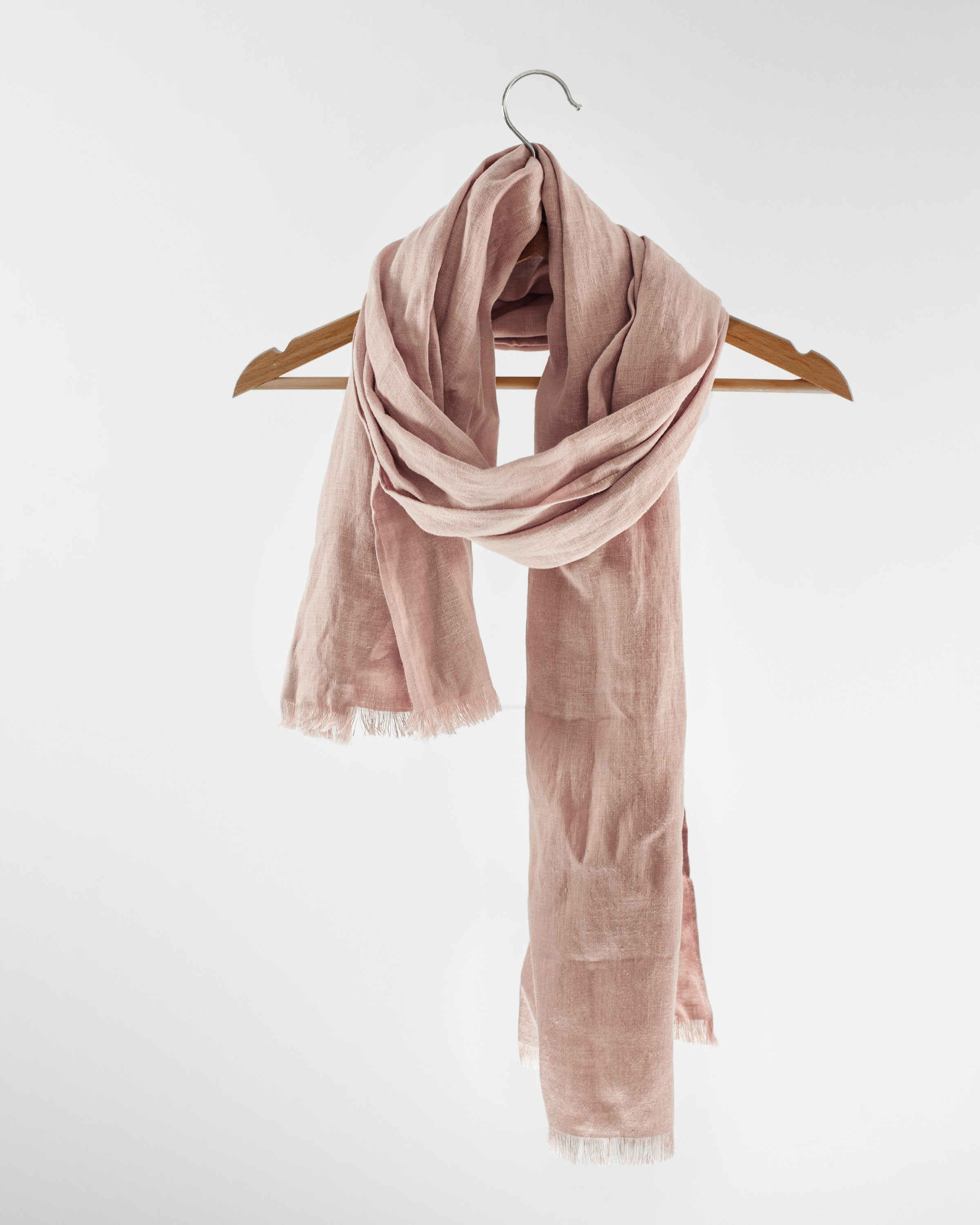 Deep Rose linen scarf made from 100% stonewashed linen, showcasing its elegant drape and soft texture.