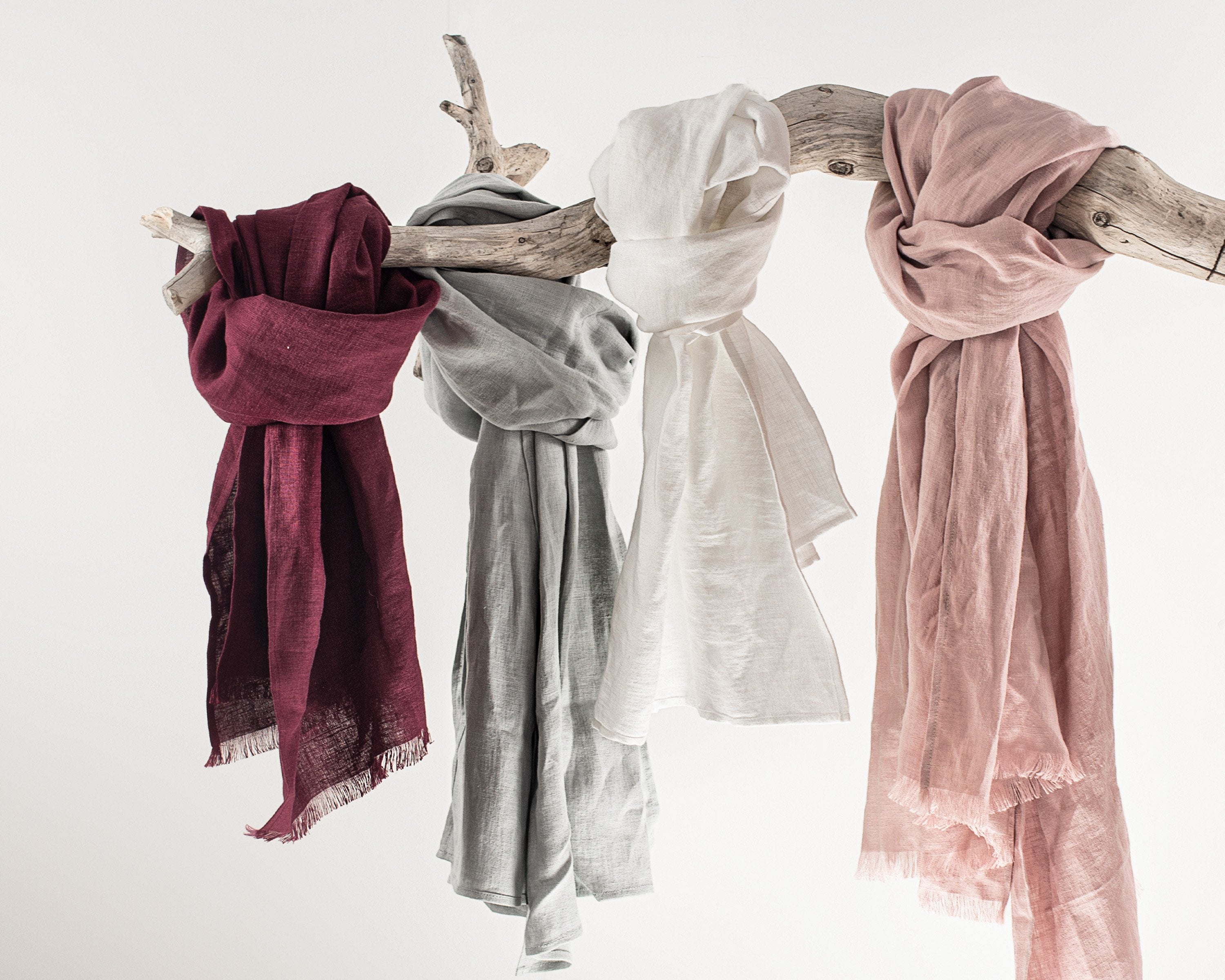 Deep Rose linen scarf made from 100% stonewashed linen, showcasing its elegant drape and soft texture.