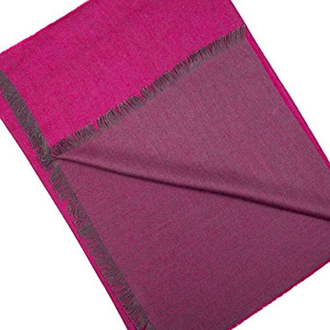 Elegant fuchsia shawl made of 70% baby alpaca and 30% silk, showcasing its luxurious texture and vibrant color.