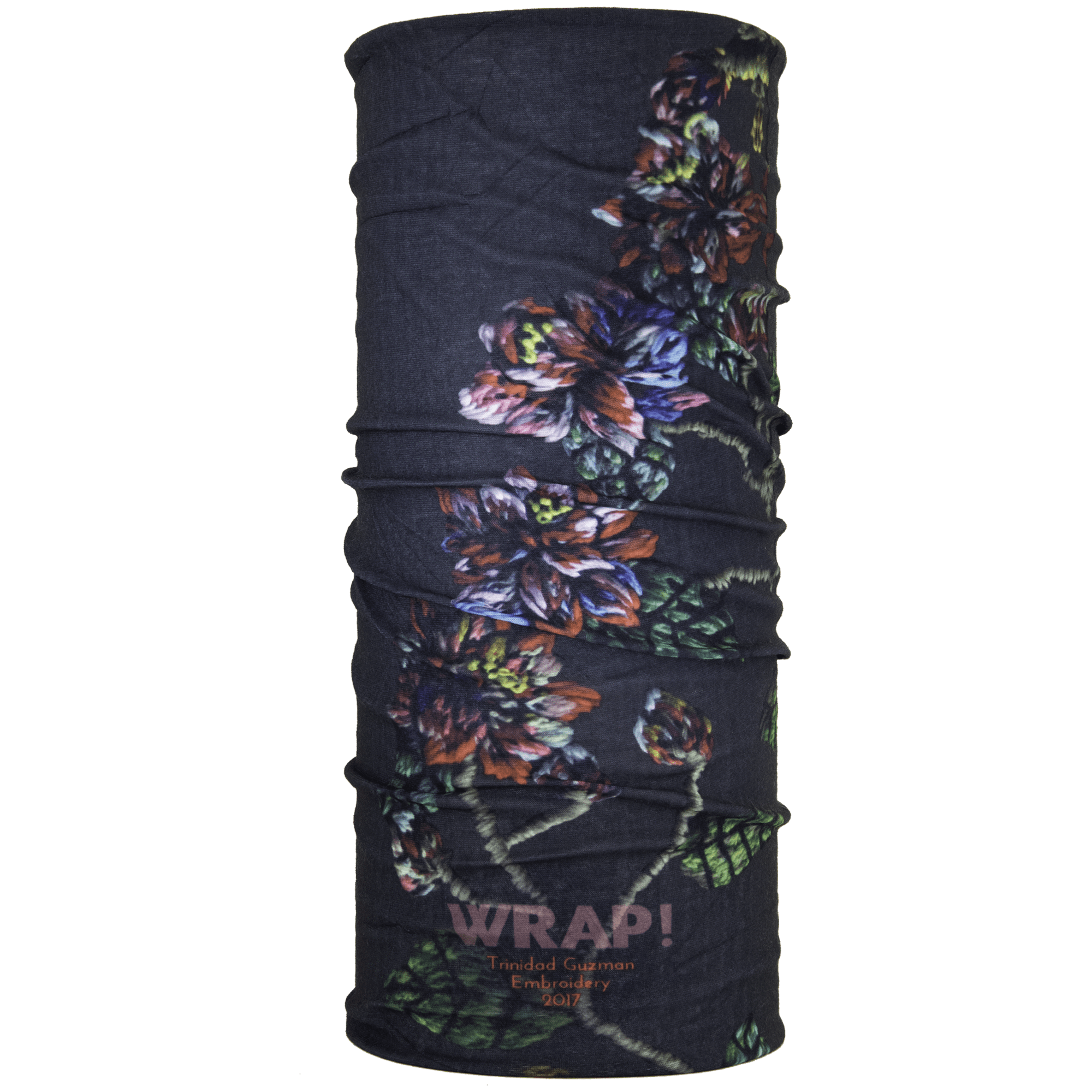 Embroidery Wrap featuring intricate floral designs by artist Trinidad Guzmán, showcasing its multifunctional use and vibrant colors.