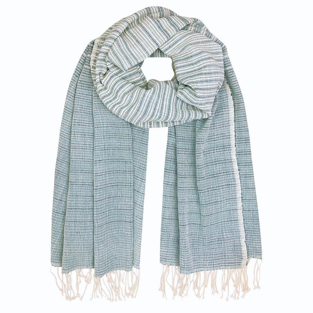 Ethiopia Handloom Wrap Scarf showcasing vibrant colors and hand-knotted fringe, made from pure cotton.