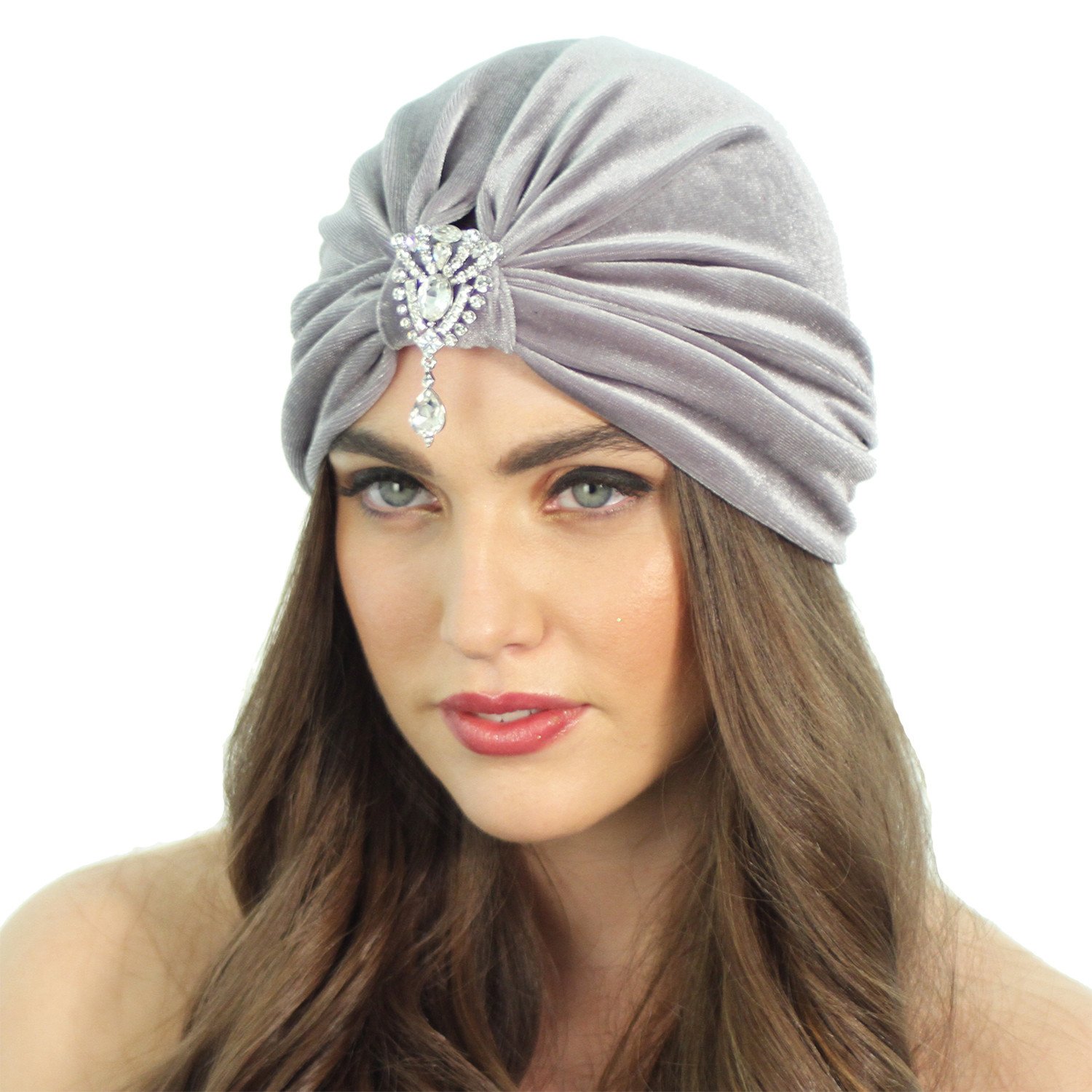 Flapper Pendant Turban in plush stretch velvet with a removable crystal encrusted brooch, showcasing its elegant design.