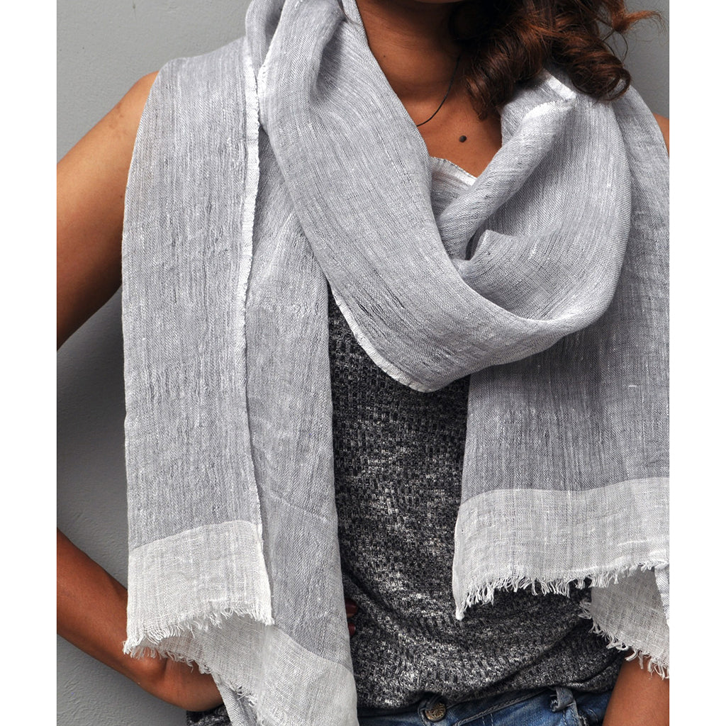 Handwoven Gauze Linen Two Tone Scarf with eyelash fringe, showcasing a white stripe, perfect for adding texture to outfits.