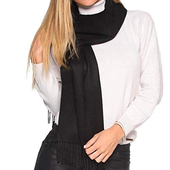 Luxurious black scarf made from 100% baby alpaca wool, showcasing its soft texture and elegant design.