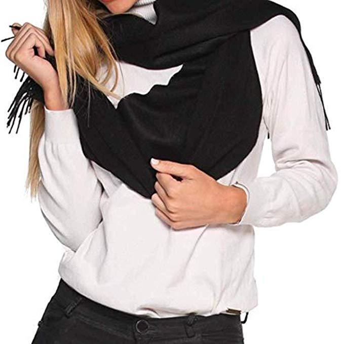 Luxurious black scarf made from 100% baby alpaca wool, showcasing its soft texture and elegant design.