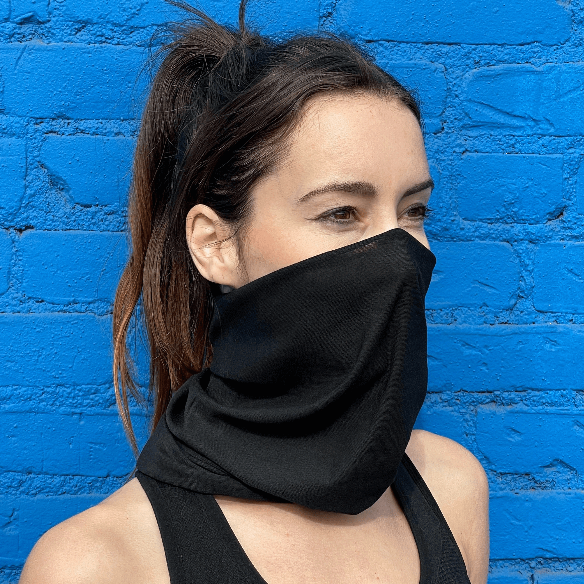 A stylish Hemless Neck Gaiter in various colors, designed for outdoor activities like hiking and cycling, showcasing its versatility and comfort.