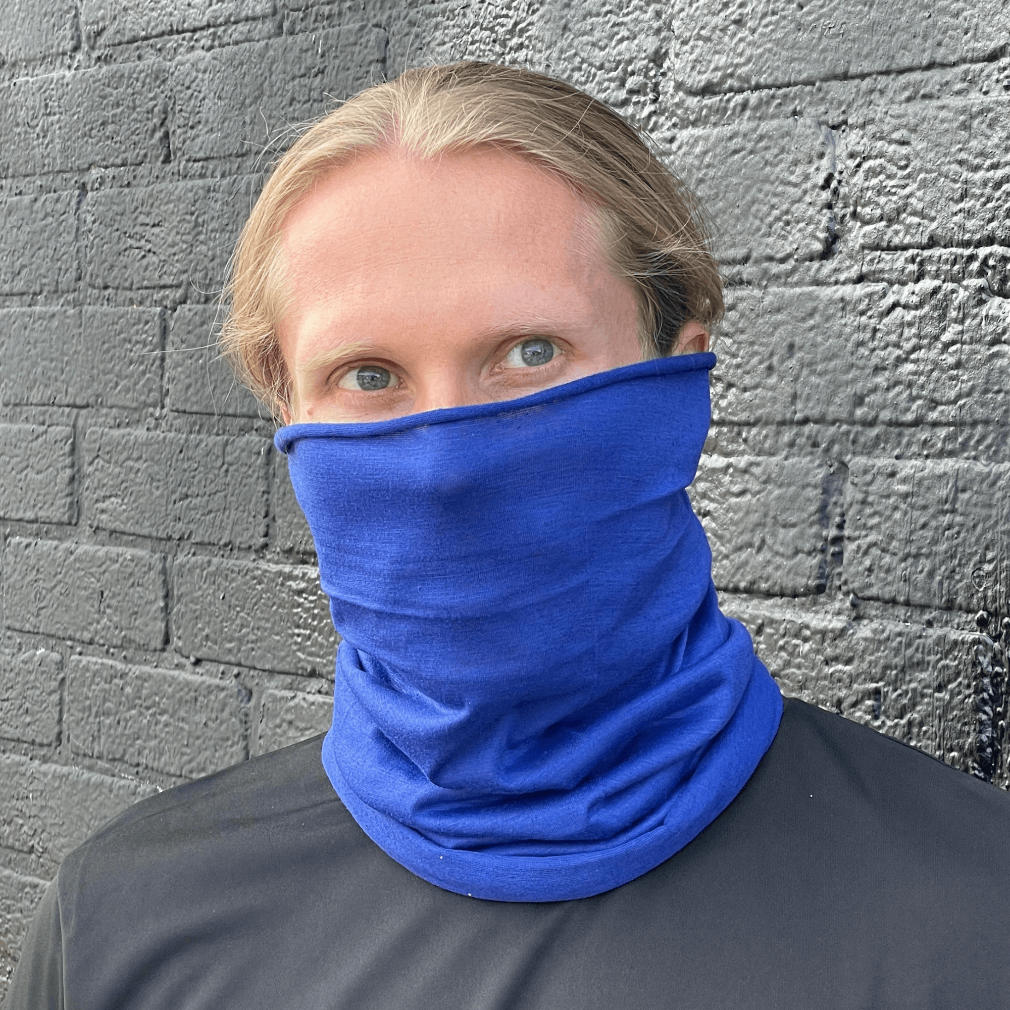 A stylish Hemless Neck Gaiter in various colors, designed for outdoor activities like hiking and cycling, showcasing its versatility and comfort.