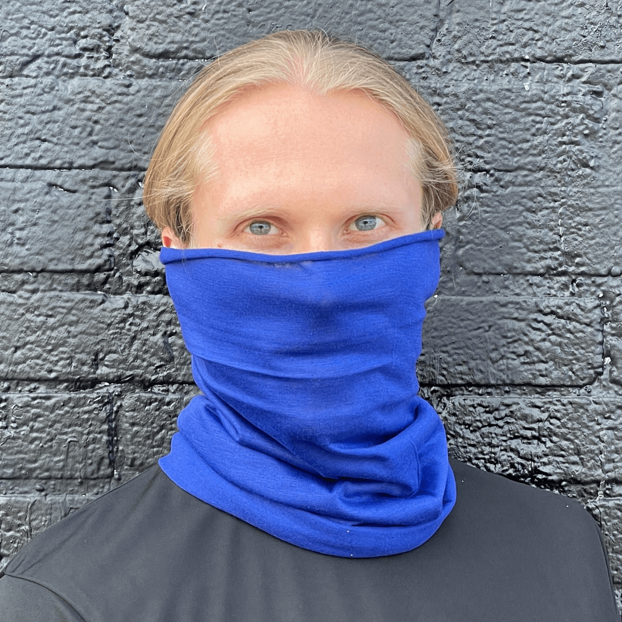 A stylish Hemless Neck Gaiter in various colors, designed for outdoor activities like hiking and cycling, showcasing its versatility and comfort.