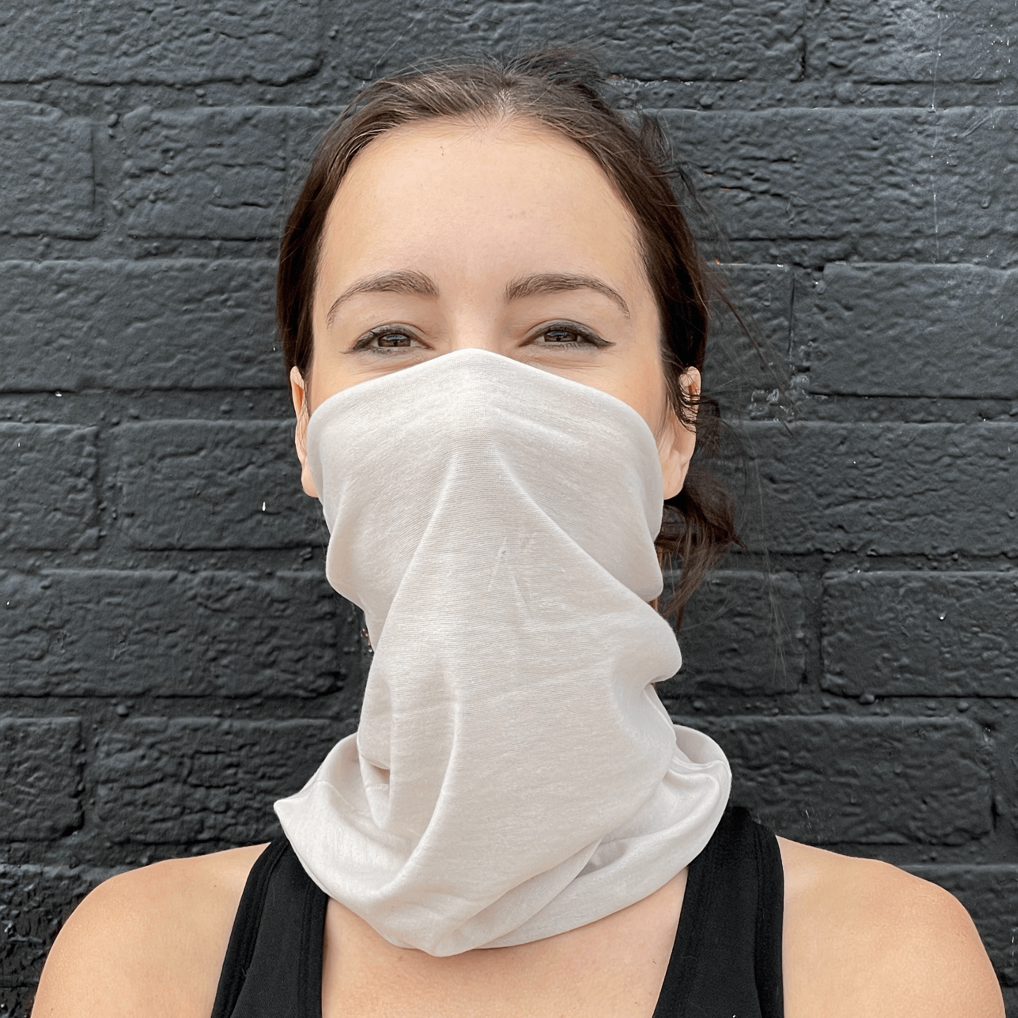 A stylish Hemless Neck Gaiter in various colors, designed for outdoor activities like hiking and cycling, showcasing its versatility and comfort.