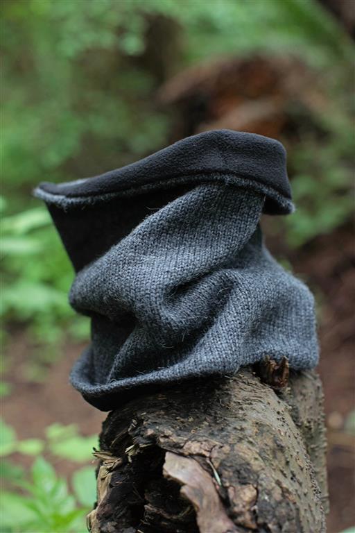 Iditarod Baby Alpaca Lined Neck Gator in black and grey, showcasing its soft fleece lining and stylish design, perfect for outdoor activities.