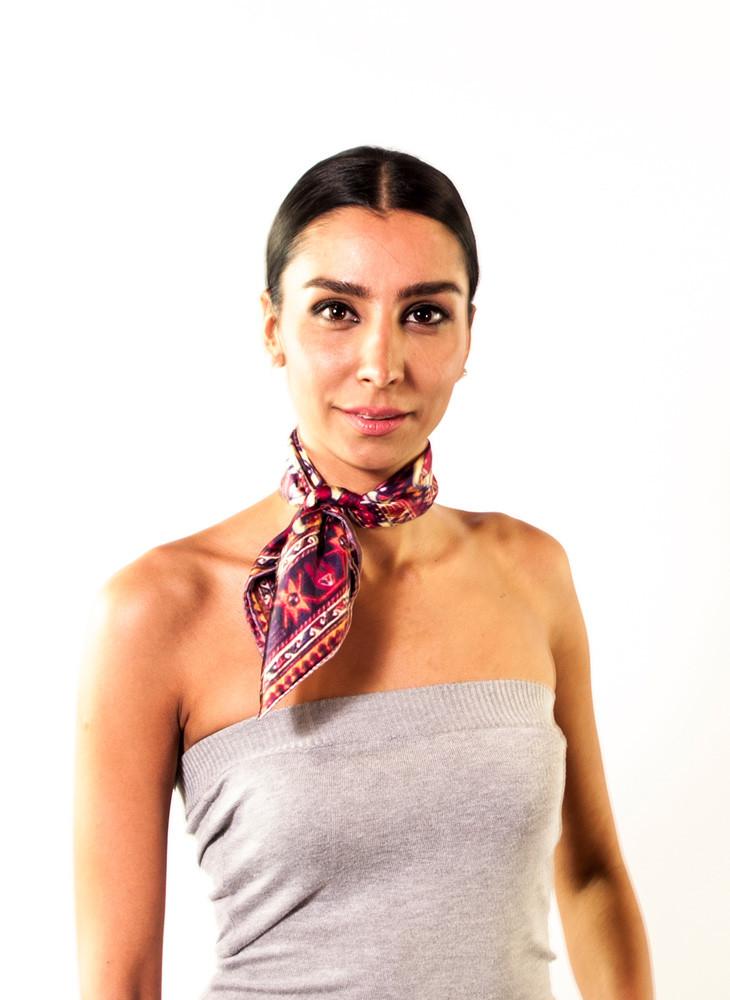 Khali Necktie Scarf featuring a vibrant Armenian carpet design in warm colors, made from 100% silk twill, elegantly folded in a gift box.