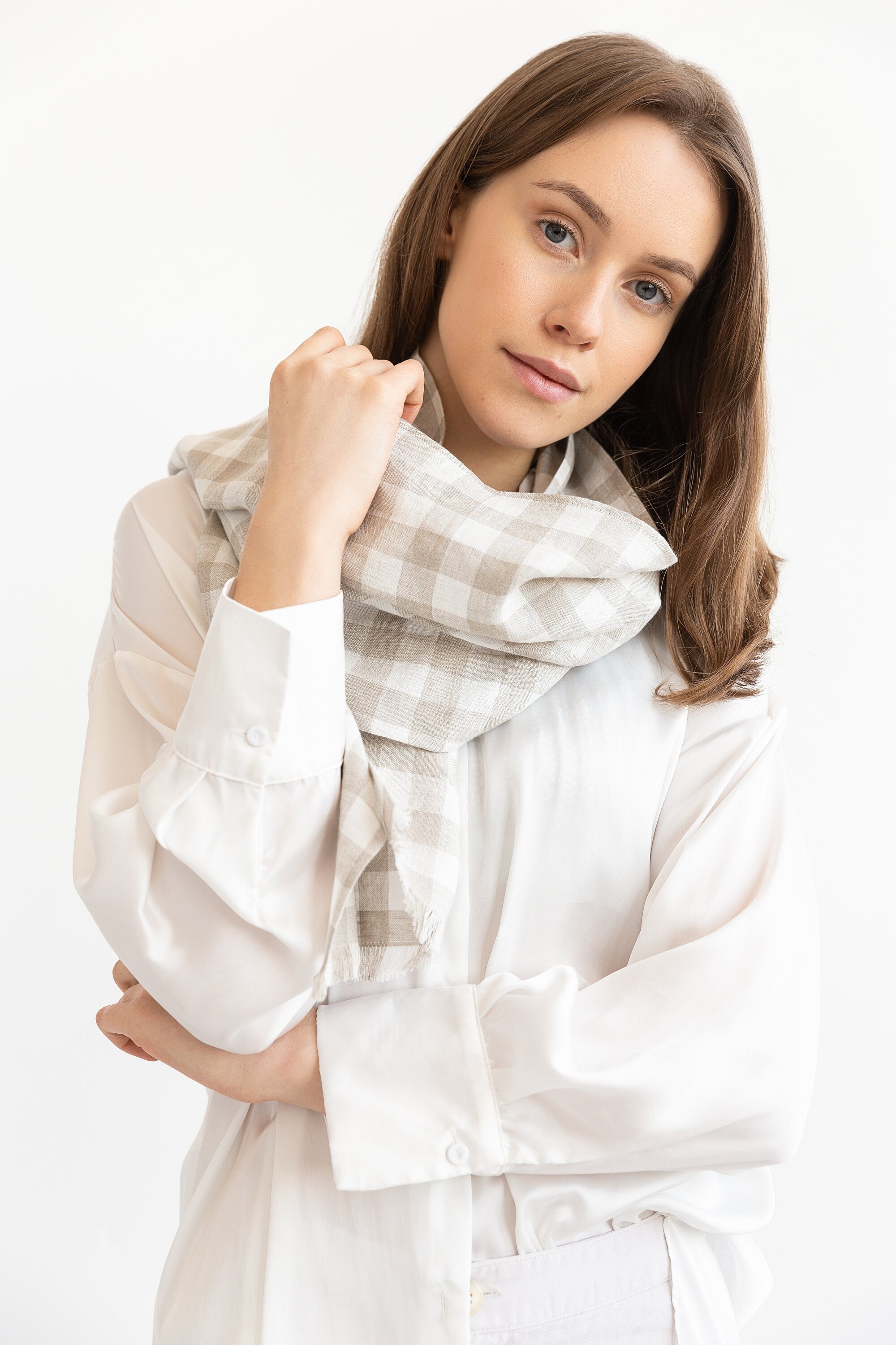 Elegant Natural linen scarf in Natural and White Check design, made from 100% stonewashed linen, showcasing its soft texture and stylish appearance.