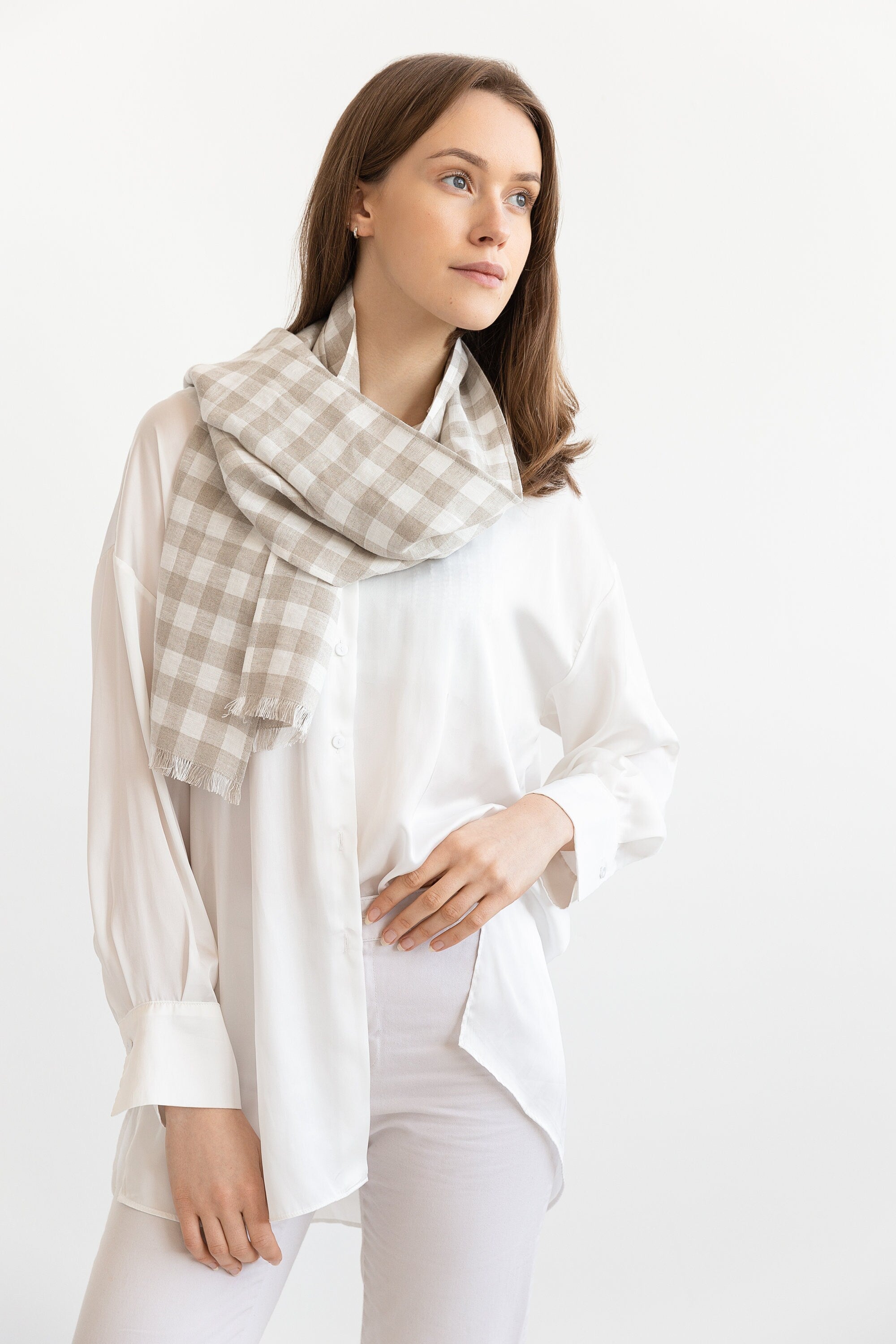 Elegant Natural linen scarf in Natural and White Check design, made from 100% stonewashed linen, showcasing its soft texture and stylish appearance.