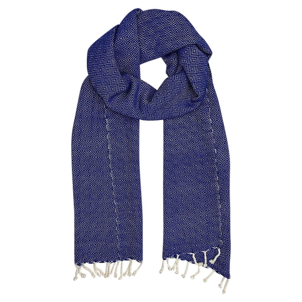 Organic Cotton Diamond Scarf with hand-knotted tassels in earthy tones, showcasing a classic diamond pattern.