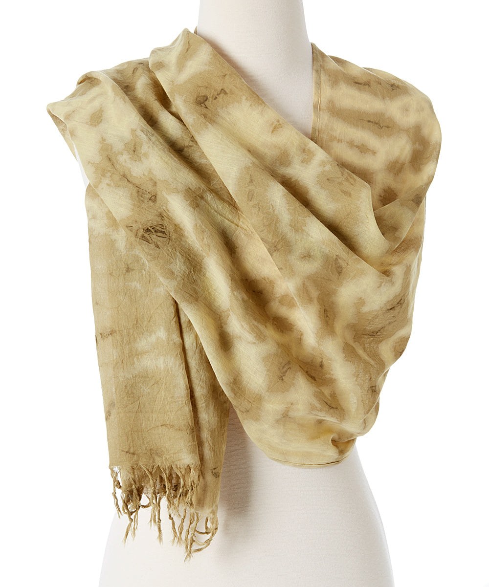 A vibrant Organic Tie Dye Scarf made from 100% organic cotton, showcasing beautiful hand-dyed patterns in natural colors.