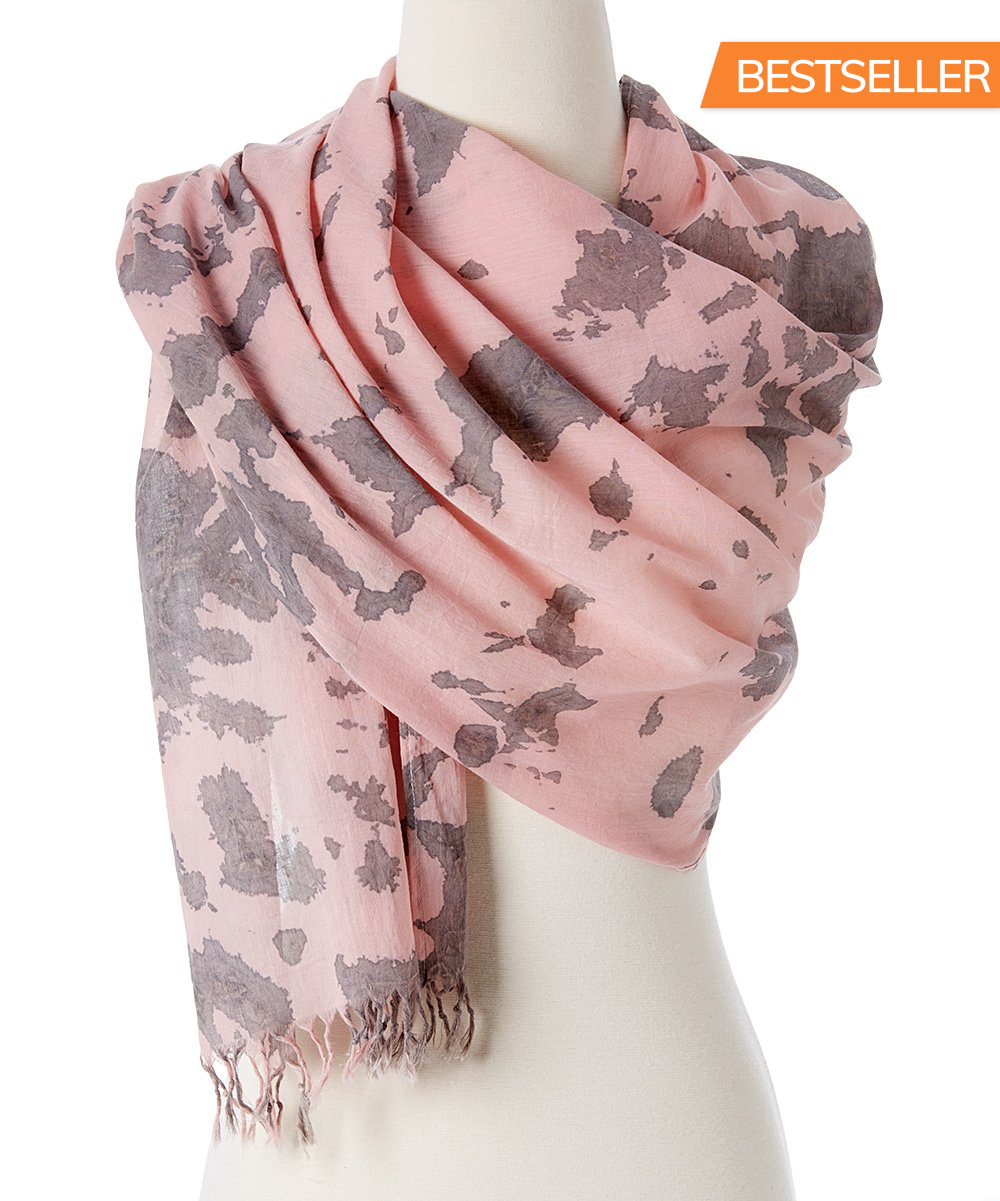 A vibrant Organic Tie Dye Scarf made from 100% organic cotton, showcasing beautiful hand-dyed patterns in natural colors.