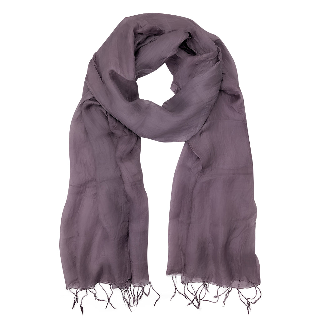 Plum Khmer Silk Scarf elegantly draped, showcasing its rich color and texture, handcrafted from 100% Khmer silk.