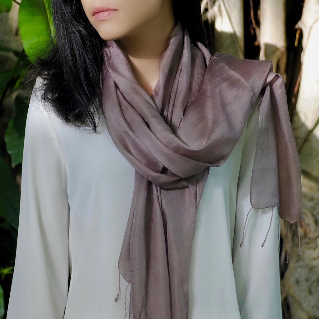 Plum Khmer Silk Scarf elegantly draped, showcasing its rich color and texture, handcrafted from 100% Khmer silk.