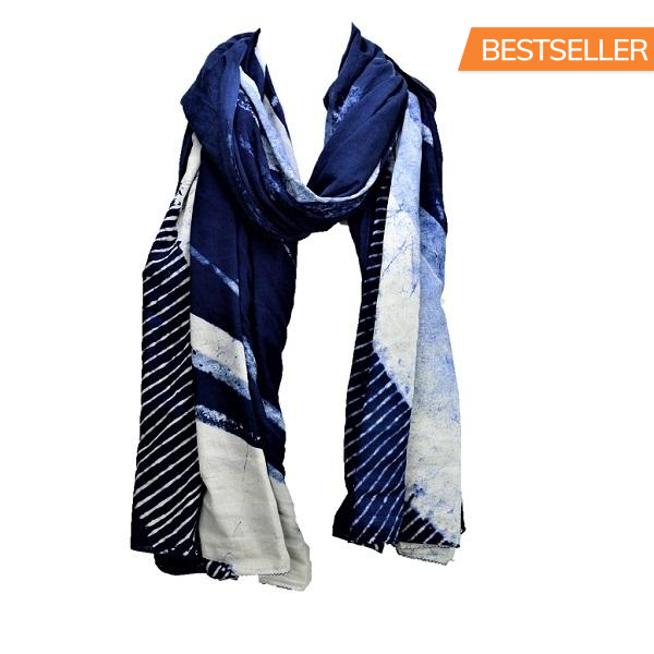 Serenity Indigo handprinted scarf showcasing unique patterns and rich indigo color, made from luxurious cotton fabric.