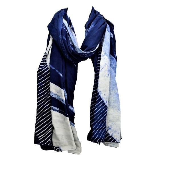 Serenity Indigo handprinted scarf showcasing unique patterns and rich indigo color, made from luxurious cotton fabric.