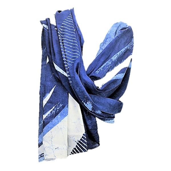 Serenity Indigo handprinted scarf showcasing unique patterns and rich indigo color, made from luxurious cotton fabric.