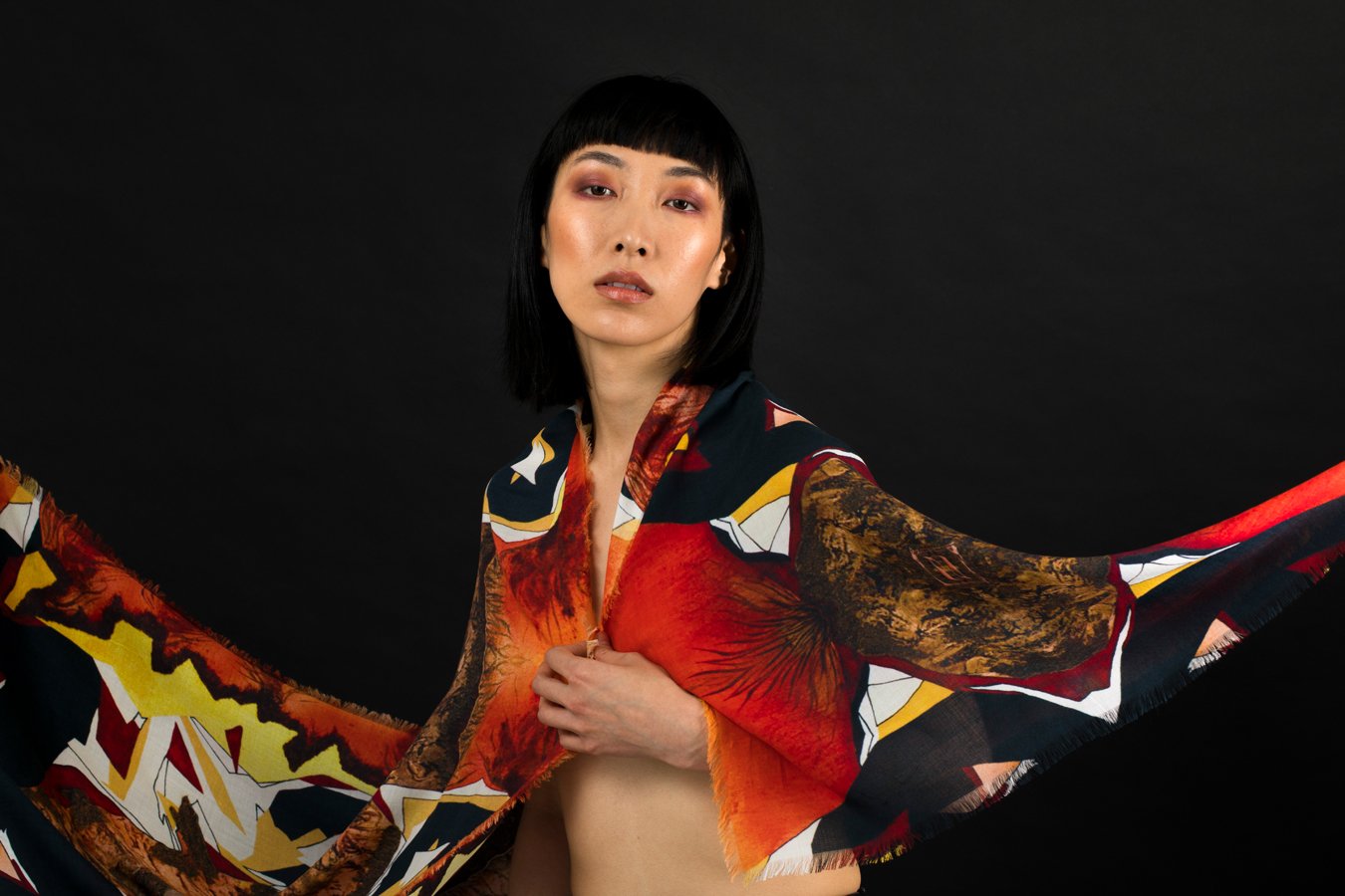 The Rest Rectangle Scarf featuring Anet Abnous's abstract painting in warm tones, showcasing a female nude in nature.