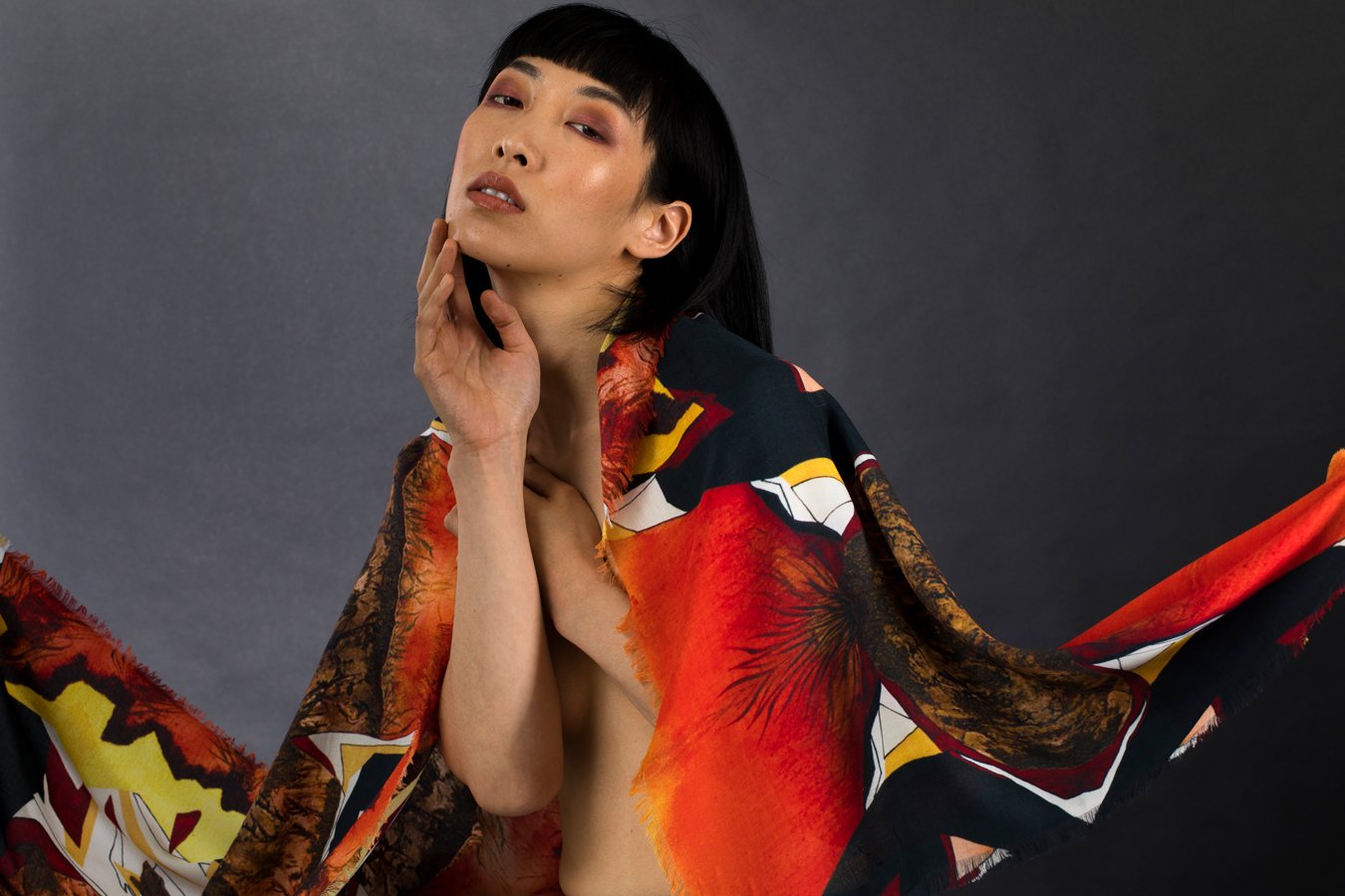 The Rest Rectangle Scarf featuring Anet Abnous's abstract painting in warm tones, showcasing a female nude in nature.