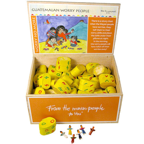 A beautifully hand-painted wooden box containing six colorful worry dolls, representing traditional Mayan craftsmanship.